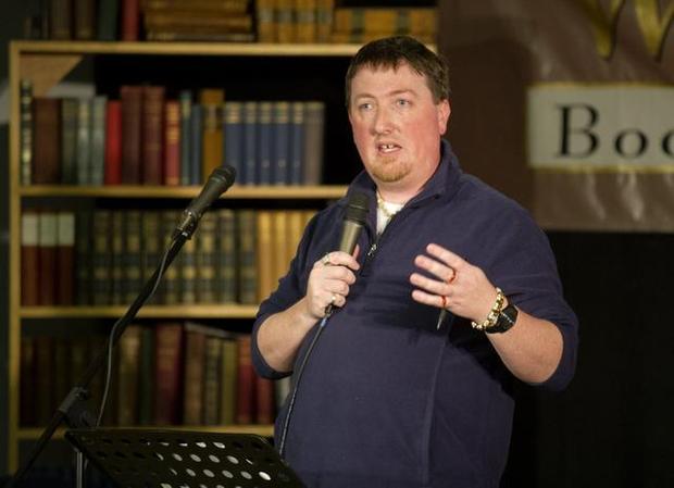 Jason Crane hosts poetry night at Websters Bookstore and Cafe on Wednesday, April 1, 2015. ABBY DREY — CDT photo